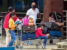 IN PICS: Amid Fear Of New Coronavirus Strain, Passengers From UK Undergo Covid Testing At Airports