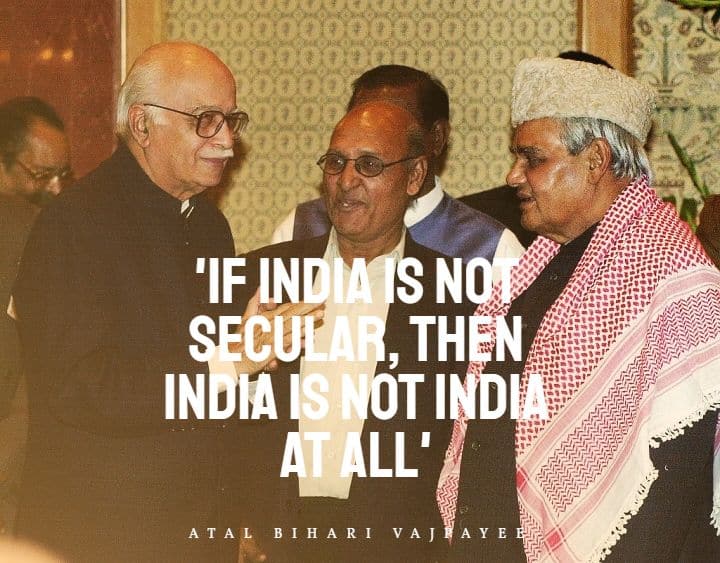 Indian Prime Minister Atal Behari Vajpayee (R) chats with Home Minister L. K. Advani (L) 19 December 2000 during an Iftar celebration hosted by the prime minister at a New Delhi hotel.