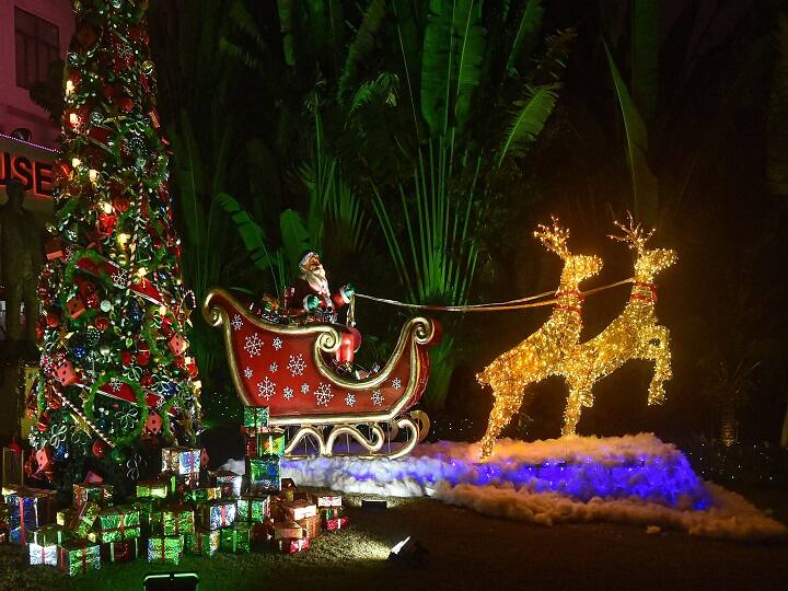 A lawn decorated with colorful lights for the upcoming Christmas festival in Kolkata. (Image: PTI)