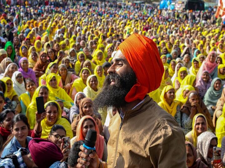 Punjabi famous Singer Kanwar Grewal performs to support farmers' protest at Tikri border. Thousands of protesting farmers, mostly from Punjab and Haryana, have been camping at three Delhi border points -- Singhu, Ghazipur and Tikri --- for the last 31 days. (Image: PTI) 