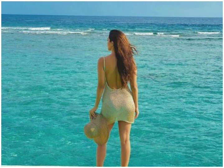 Kiara Advani picked a printed red bikini and sarong for her day at the  beach in the Maldives