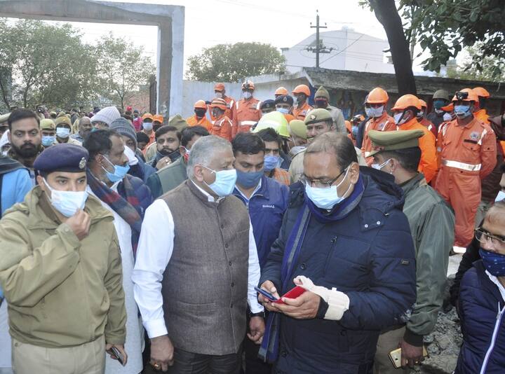 Minister of State for Road Transport General VK Singh along with other officials visited the spot where the complex roof of a crematorium collapsed. Image (PTI)