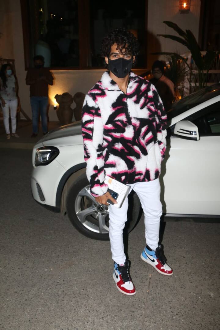 Ishaan Khatter was also spotted arriving at the birthday bash wearing a white furry jacket with abstract prints on it. 