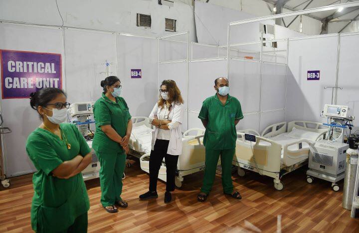 According to a statement issued by the Union health ministry, states and UTs are likely to receive the first supply of Covid-19 vaccines shortly. 
Health workers wait for volunteers at the vaccination centres in Mumbai during the second phase of nationwide dry run of Covid vaccination. (Image: PTI)