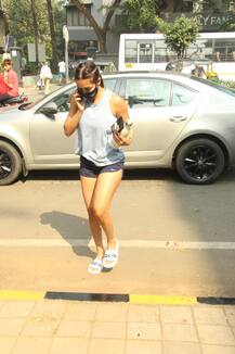 PHOTOS: Malaika Arora Clicked At Gym, Bestie Kareena Kapoor Khan Visits Clinic In Bandra