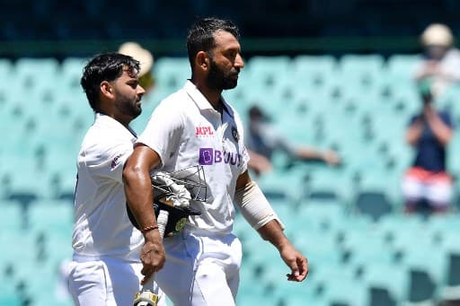Rishabh Pant and Cheteshwar Pujara record:With this, Pujara also completed his 6000 runs in Test cricket. He has become the 11th Indian batsman to complete 6000 Test runs. (Photo Courtesy: AFP)
