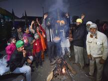 IN PICS | Protesting Farmers Celebrate Lohri By Burning Copies Of Agri Laws At Singhu Border