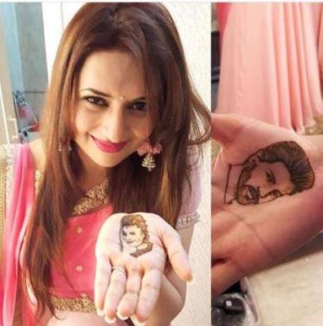टीवी अभिनेत्री दिव्यांका इस बार अपनी इस तस्वीर की वजह से सुर्खियों का हिस्सा बनी हुई हैं. इस तस्वीर में दिव्यांका के एक हाथ पर विवेक की तस्वीर है और दूसरे हाथ पर उनकी तस्वीर है.