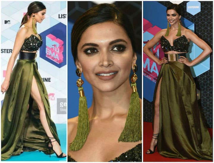 बॉलीवुड अभिनेत्री दीपिका पादुकोण ने 'MTV EMAs' अवॉर्ड्स के दौरान इंटरनेशनल रेड कार्पेट पर पहली बार नजर आई हैं. दीपिका के इस लुक की काफी चर्चा हो रही है. (Photo: AFP)