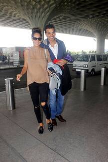 एयरपोर्ट पर पति के साथ कैमरे में कैद हुईं लीजा हेडन, दिखा बेबी बंप!