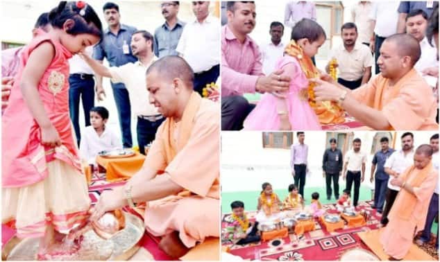 रामनवमी के अवसर पर कन्याओं को भोज कराते सीएम योगी आदित्यनाथ.