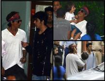 मुंबई एयरपोर्ट पर बेटे अबराम और आर्यन के साथ कैमरे में कैद हुए शाहरूख खान, देखें PICS