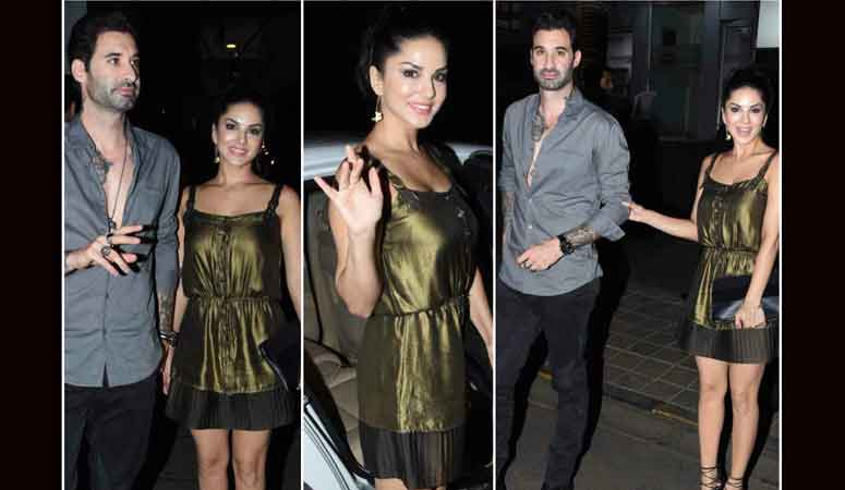 बॉलीवुड अभिनेत्री सनी लियोनी हमेशा ही अपने बोल्ड अदाओं के लिए जानी जाती हैं. उनकी और उनके पति की ये तस्वीरें तब ली गईं जब वे मुंबई के एक चाइनीज़ रेस्टोरेंट से डिनर करके वापस लौट रहे थे.