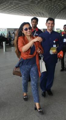 एयरपोर्ट पर ग्लैमरस अंदाज़ में कैमरे में कैद हुईं रानी मुखर्जी!