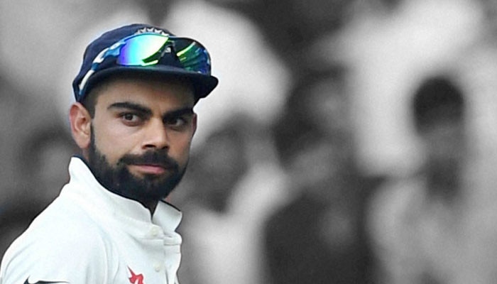 WATCH: Virat caught chewing gum during national anthem before India-SL Test series opener in Kolkata भारतीय कप्तान विराट कोहली ने किया राष्ट्रगान का 'अपमान'