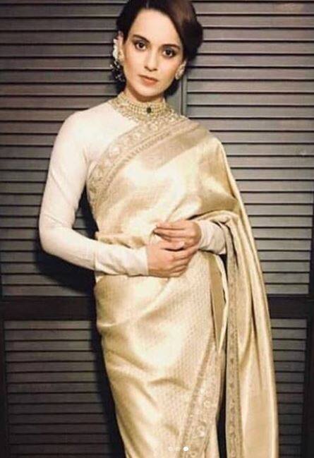 रिसेप्शन में कंगना साड़ी पहनकर पहुंची.