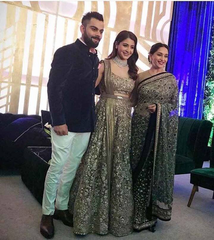 रिसेप्शन में माधुरी के साथ तस्वीर खिंचवाते दिखे विराट-अनुष्का.