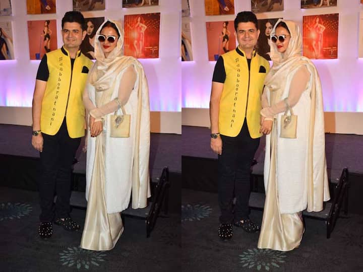 रेखा ने व्हाइट एंड ब्लैक वाइड शेड्स के साथ हाथ में क्लच लिया था जो उनके लुक को और भी आकर्षक बना रहा था.