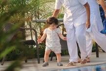 PHOTOS: स्विमिंग पूल के पास चलने की प्रैक्टिस करते नजर आए तैमूर अली खान