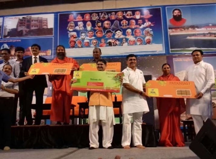 all you need to know about baba ramdev's patanjali mobile sim card ₹144 में 2GB डाटा से लेकर इंश्योरेंस तक, जानें पतंजलि सिम कार्ड की सभी खूबियां