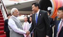 SCO Summit: चीन पहुंचे पीएम मोदी, आंतकवाद से निपटने पर कर सकते हैं बातचीत