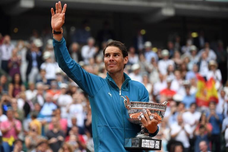 नडाल ने रिकॉर्ड 11वीं बार जीता फ्रेंच ओपन का खिताब Rafael Nadal beats Dominic Thiem in the finals of French Open to clinch the Men's Singles title. नडाल ने रिकॉर्ड 11वीं बार जीता फ्रेंच ओपन का खिताब