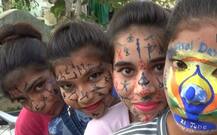 इंटरनेशनल योगा डे : लोगों को जागरुक करने के लिए छात्राओं ने चेहरे पर बनवाए योग के आसन