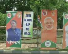 कोलकाता पहुंचे अमित शाह, रैली ग्राउंड को ममता के कार्यकर्ताओं ने TMC पोस्टरों से रंगा