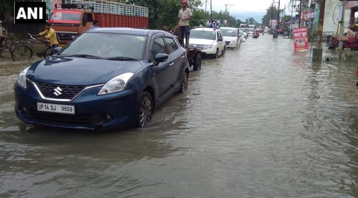 राष्ट्रीय राजधानी में न्यूनतम तापमान 26.8 डिग्री सेल्सियस रहा. मौसम विभाग ने कल दिल्ली में आकाश में बादल छाये रहने और हल्की से मध्यम बारिश की संभावना प्रकट की है. तस्वीर: एएनआई