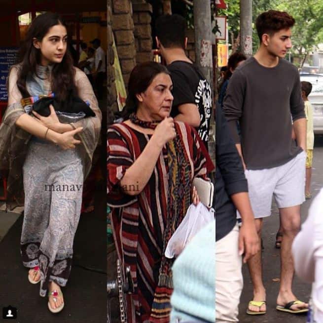 तस्वीरों में आप देख सकते हैं कि अमृता सिंह इस दौरान काफी सारा सामान पकड़े अपने बच्चों के साथ ही थीं. (तस्वीर: मानव मंगलानी)