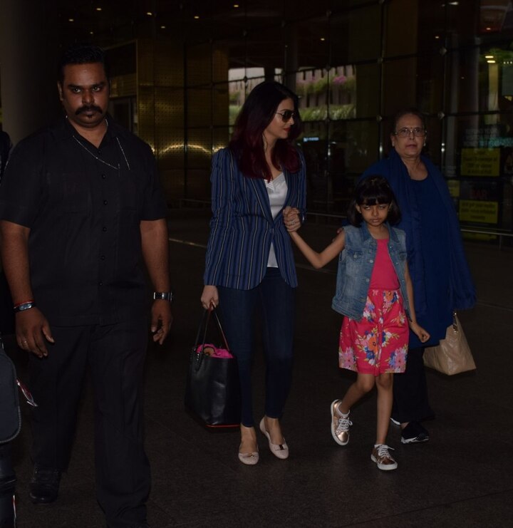 पूर्व मिस वर्ल्ड और बॉलीवुड अभिनेत्री ऐश्वर्या राय बच्चन शुक्रवार देर रात विदेश से लौटी इस दौरान उनका साथ उनकी मां वृंदा राय और बेटी आराध्या बच्चन सात में दिखाई दी. उस दौरान उनकी काफी सारी खूबसूरत तस्वीरें हम आपके लिए लाए हैं जिन्हें आप आगे की स्लाइड्स का रुख करके देख सकते हैं. (तस्वीर: मानव मंगलानी)