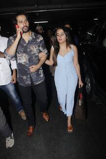 SPOTTED: गर्लफ्रेंड नताशा का हाथ थामे गोवा से वापस लौटे अभिनेता वरुण धवन, देखें तस्वीरें