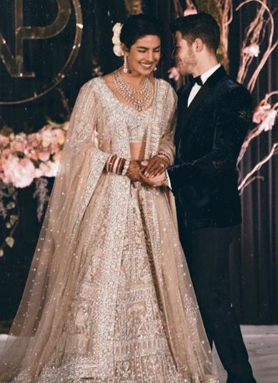 This Bride Wore The Monochrome Red Lehenga Better Than Priyanka Chopra! -  Wedbook | Indian bridal dress, Bridal lehenga red, Indian bride outfits