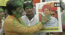 कांग्रेस के कार्यकर्ताओं ने \'अच्छे दिन की आहट\' पर इस तरह मनाया जश्न, देखें तस्वीरें