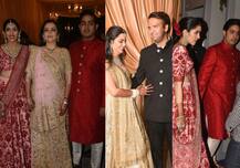 मंगेतर का हाथ थामे बहन ईशा के रिसेप्शन में पहुंचे आकाश अंबानी, लाल लहंगे में दिखीं श्लोका
