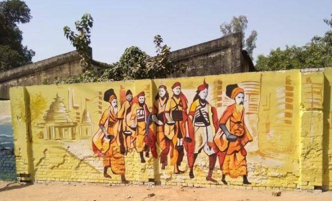 योगी सरकार ने कुंभ को लोगों के दिलों दिमाग में बैठा देने के सपने के साथ एड़ी से चोटी का जोर लगा दिया है. मेले के दौरान प्रयागराज आने पर आपको यहां की दीवारें बोलती हुई नजर आएंगी. तस्वीर: kumbh.gov.in