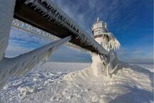 तस्वीरें | पोलर वॉरटेक्स: प्रकृति के कहर से जमकर थमा दुनिया का सबसे ताकतवर देश,अब तक 21 की मौत