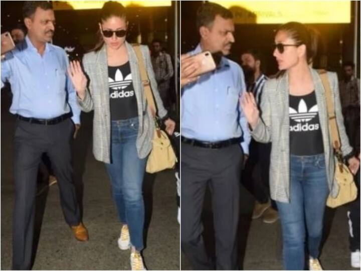 Kareena Kapoor angry over fan trying to take selfi on airport when kareena was with taimur Video: बेटे तैमूर का हाथ थामे एयरपोर्ट पर जा रही थीं करीना कपूर, सेल्फी लेने आए फैन पर भड़कीं