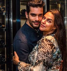 कैमरे के आगे पति की बांहों में इस तरह खोई नजर आई नेहा धूपिया, देखें तस्वीरें