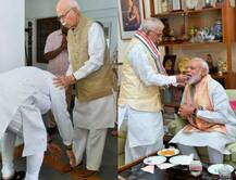 लोकसभा चुनावों में \'प्रचंड\' जीत के बाद आडवाणी के पैर छूते और जोशी से मिठाई खाते नजर आएं पीएम मोदी, देखें तस्वीरें