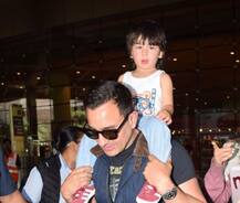 IN PICS: छुट्टियां मनाकर मुंबई लौटे करीना और सैफ, पापा के कंधे पर इंजॉय करते दिखे तैमूर