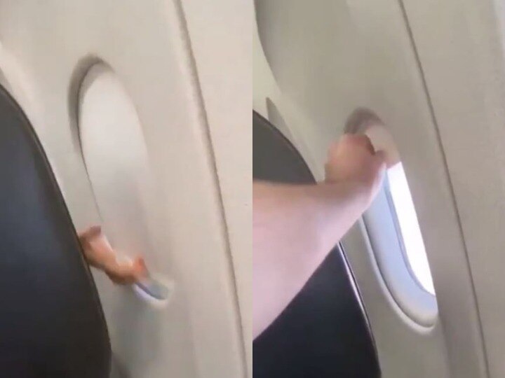 Viral Video Watch grown men get into window shade war on flight Viral: फ्लाइट में विंडो शेड को लेकर दो लोगों में हुई जमकर लड़ाई, सोशल मीडिया पर वायरल हो रहा वीडियो