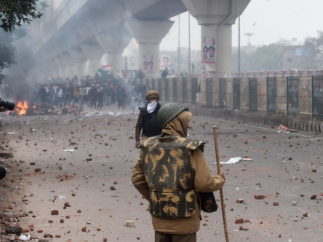 Protest against Citizenship Amendment Act: Police use tear gas shells to disperse the protesters after a clash broke out between police and protesters in Seelampur Jafrabad area