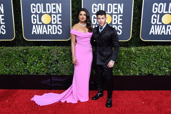 रेड कार्पेट पर दोनों ने एक दूसरे के साथ जबरदस्त अंदाज में पोज दिए. (Photo Credit: Getty Images)