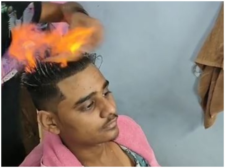Barber Cutting Hair After Setting Fire On The Head Video Went Viral On  Social Media | TikTok: सिर पर आग लगाकर बाल काट रहा नाई, सोशल मीडिया पर  वायरल हुआ वीडियो