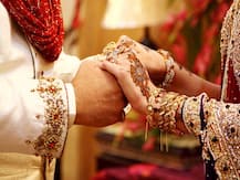 पंजाब: शादी समारोह पर कोरोना वायरस का खौफ, दूल्हे-दुल्हन ने चेहरे पर मास्क पहनकर की शादी