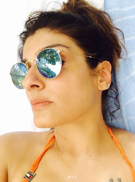 Sexy : Raveena Tandon shares hot pictures in bikini with husband, See  scorpion tattoo â€“ The State