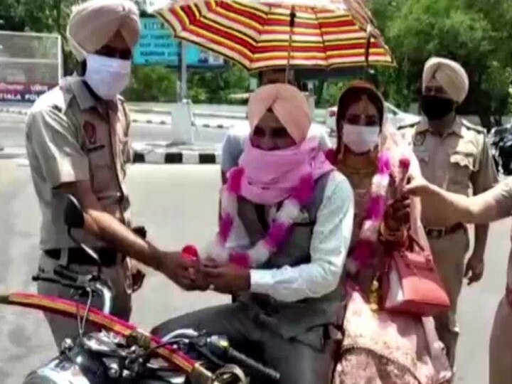 Yuvraj tied knot with Chand Preet during lockdown in Patiala पंजाब: लॉकडाउन में बुलेट पर घर लाए दुल्हनिया, रास्ते में पुलिस ने फूल देकर दी बधाई