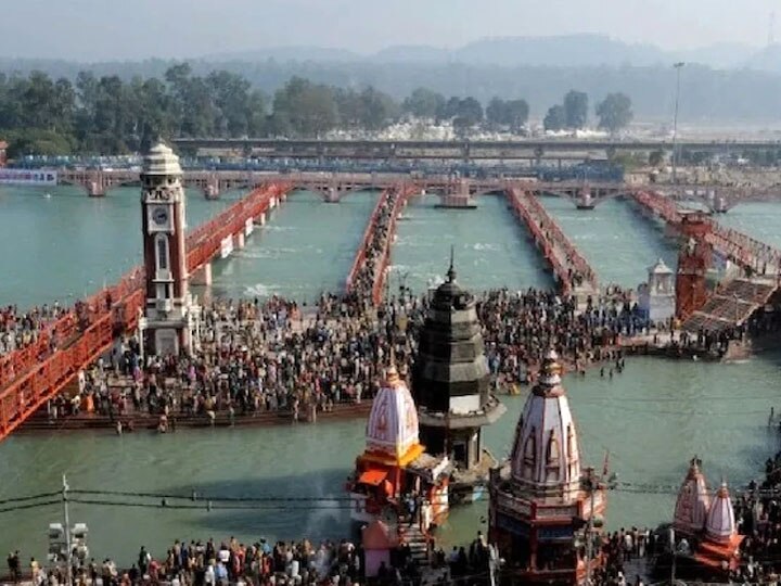 Haridwar district administration said Pilgrims will need passes for Kumbh Mela  Kumbh Mela 2021: कुंभ मेले में एंट्री के लिए दिखाना होगा पास, देनी होगी RTPCR रिपोर्ट