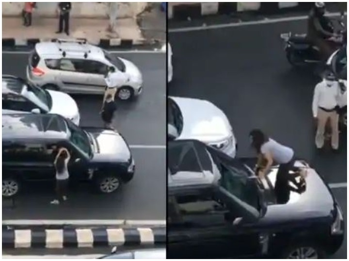roar of 'husband, wife on the road of Mumbai मुंबई की सड़क पर दिखा 'पति, पत्नी और वो' का हंगामा, पति की गाड़ी पर चढ़ गई महिला